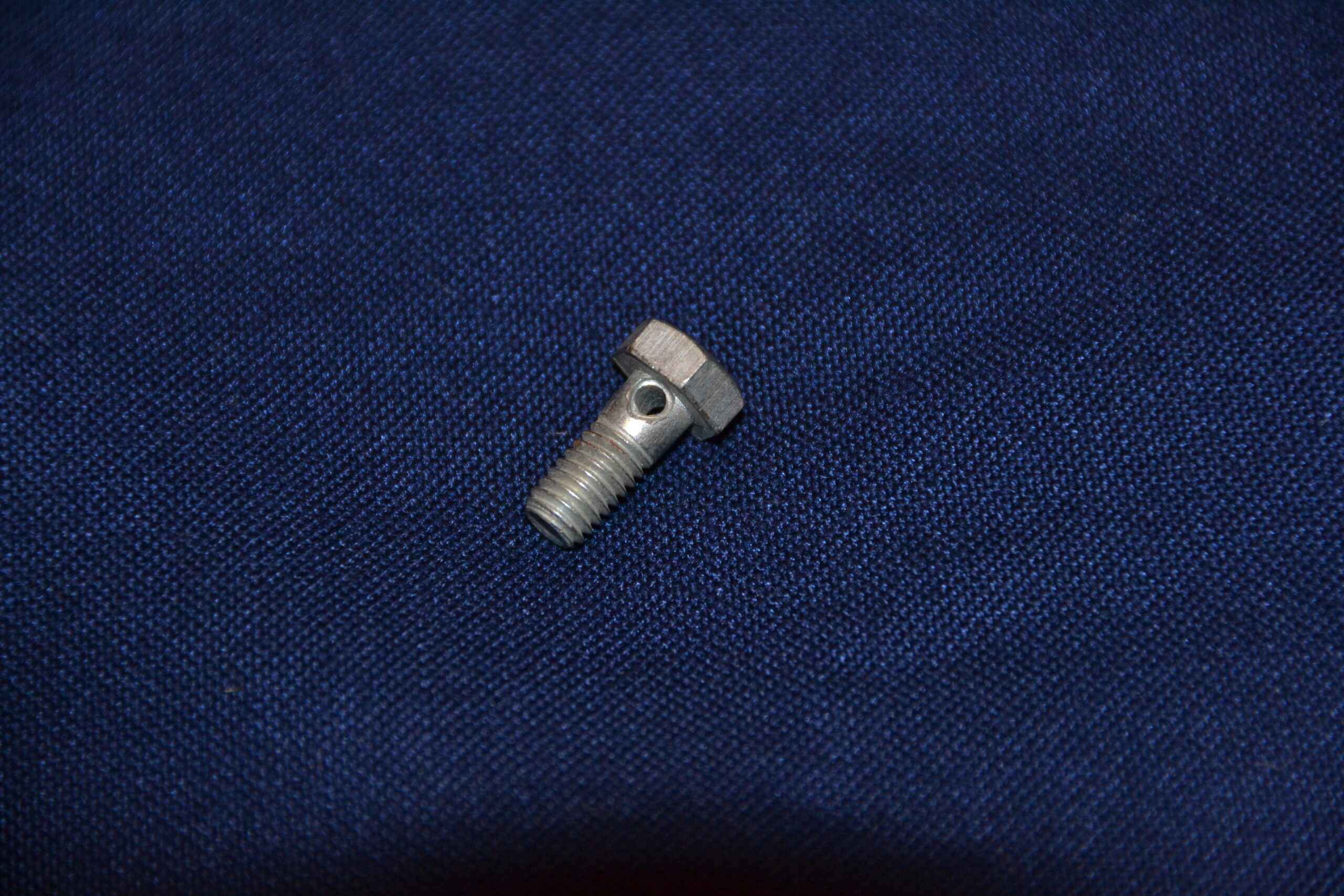 Bolt (special) - Release cable attachment. Suits bonnet locking plate. Fulvia.