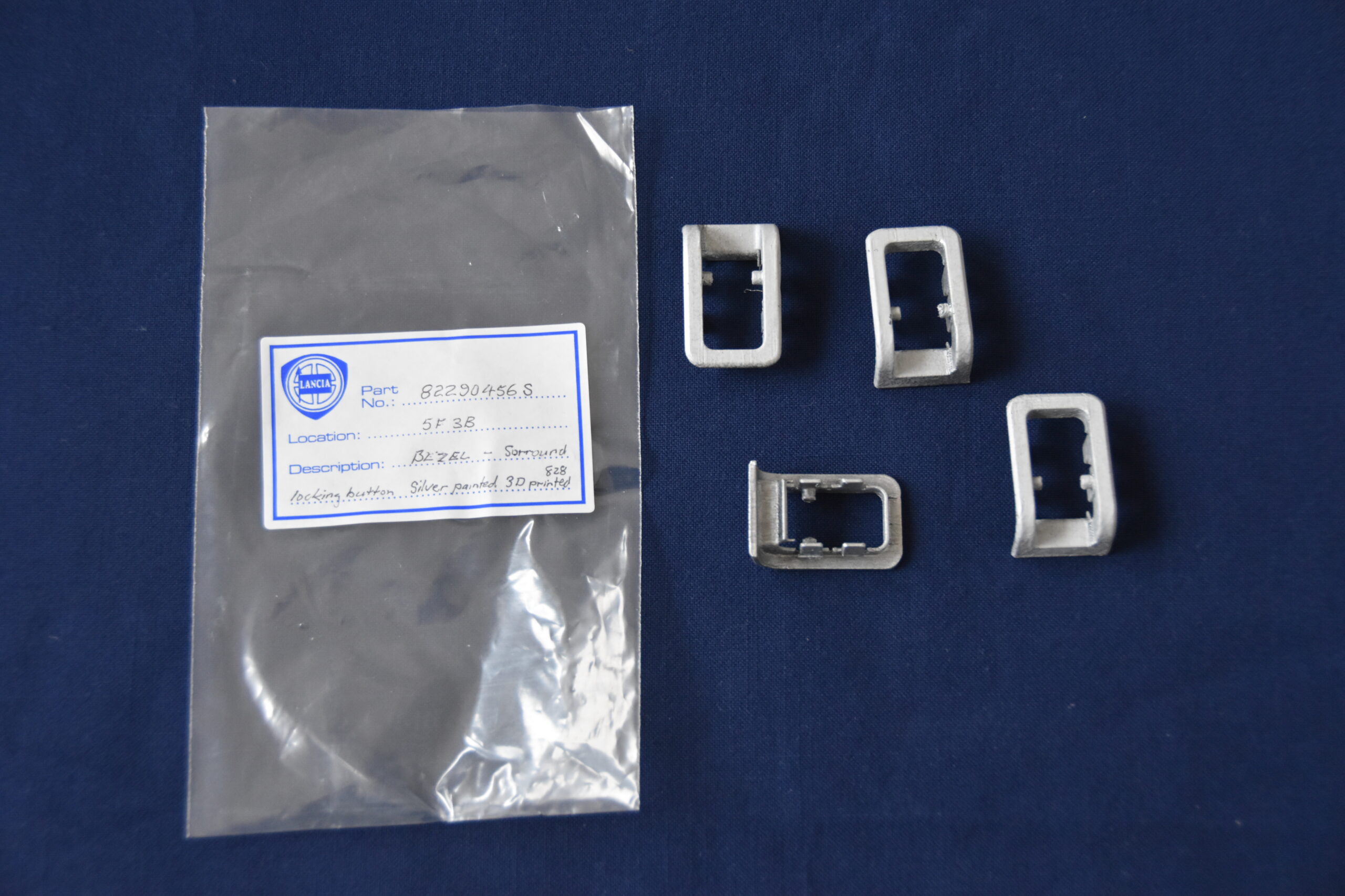 Bezel - Surround. Door lock. Beta & Gamma